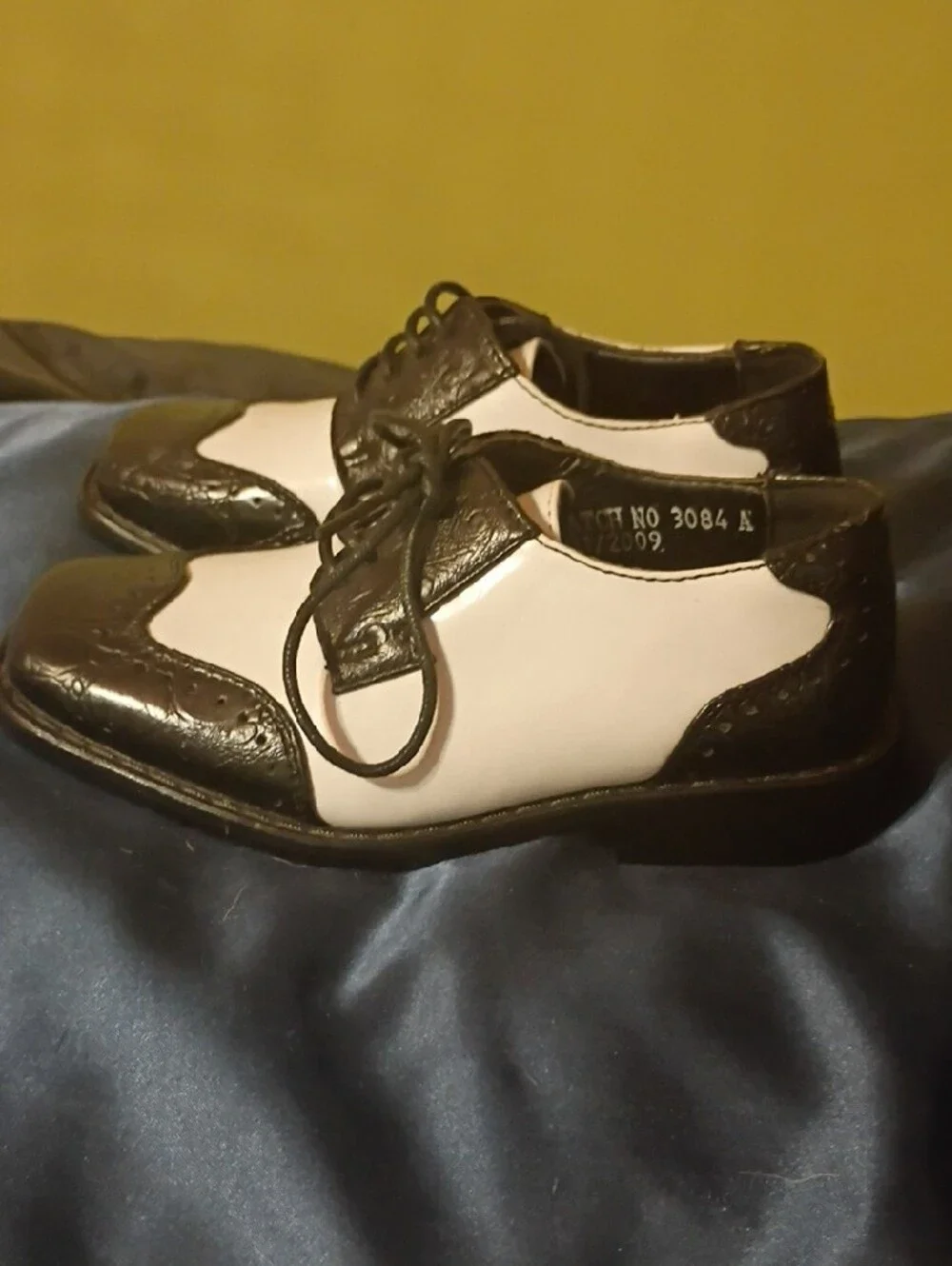 Classic Black and White Men’s Wingtip Oxfords